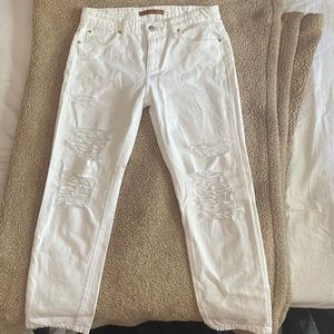 Joe’s white mid rise distressed jeans.